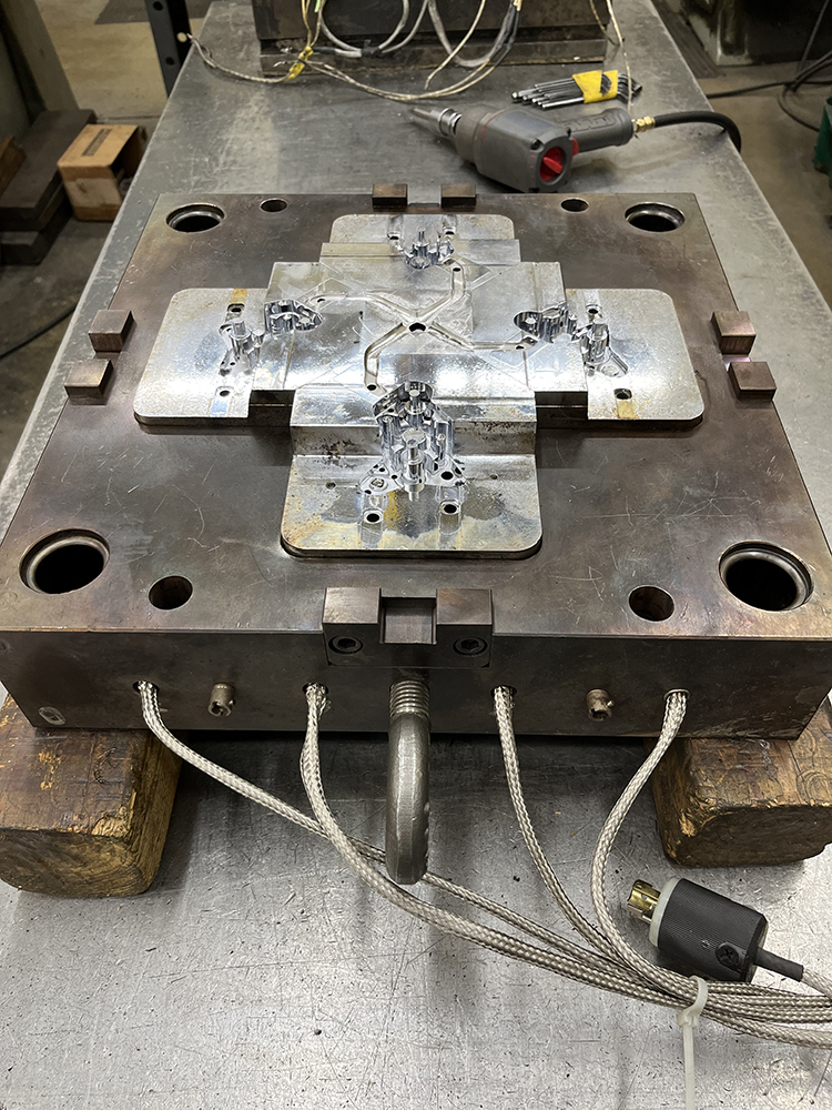 Injection Mold being cleaned before production